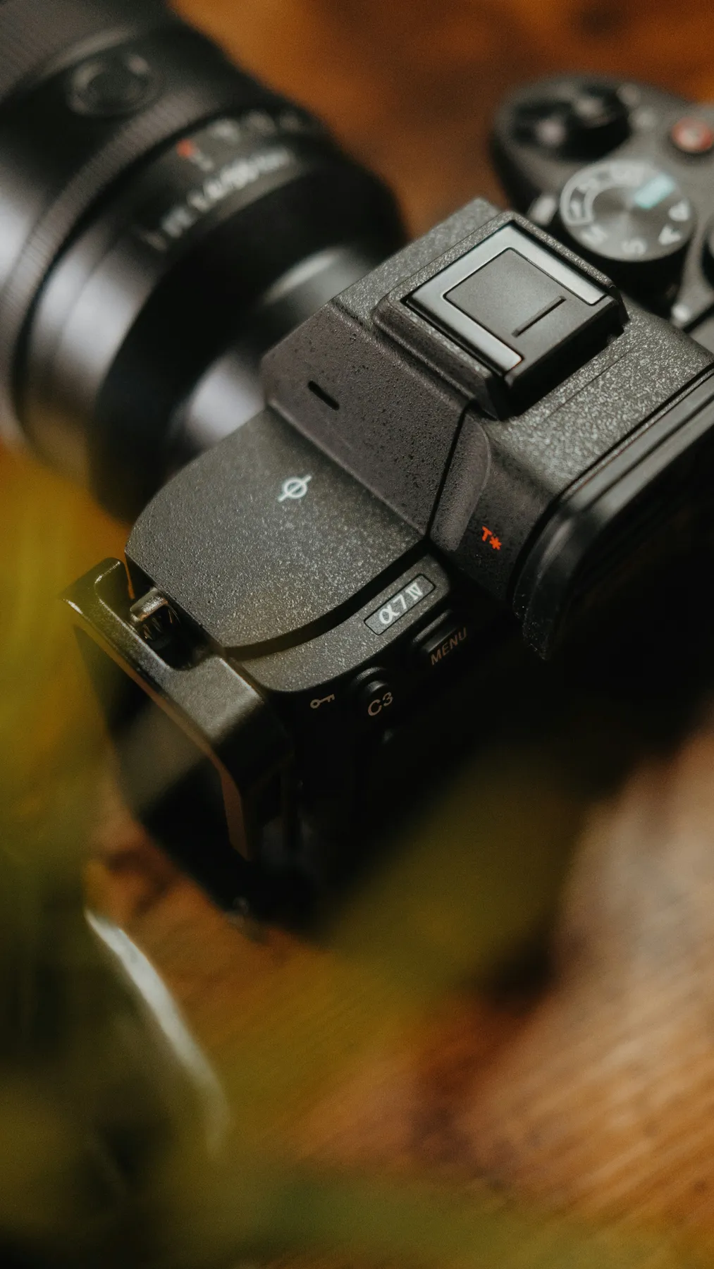 Close-up of Sony A7 IV top plate showing the alpha 7 IV model badge and hot shoe
