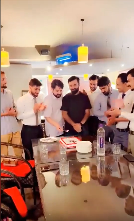 Health Point Pakistan team celebrating 30,000 YouTube subscribers with a cake-cutting ceremony, captured by AK Studios