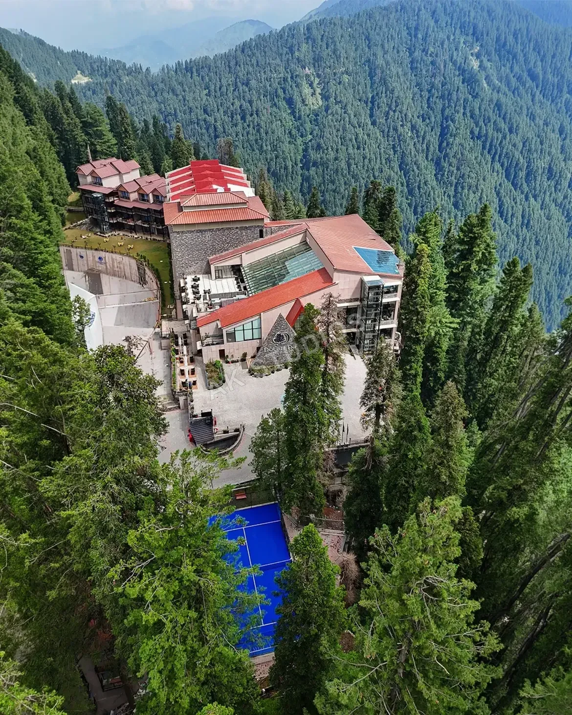 Aerial drone photography of a mountain resort by AK Studios